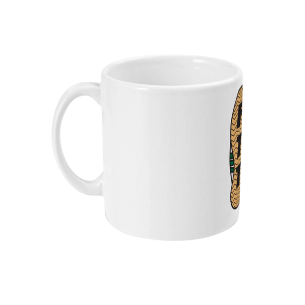 An 11oz ceramic mug with a glossy white finish featuring a brown and black design of a trainer sole.