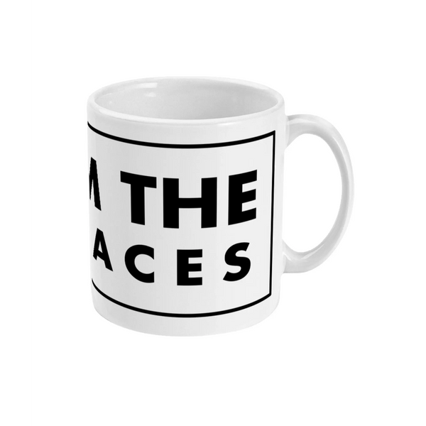 A white ceramic mug with black text that reads 'FROM THE TERRACES'.