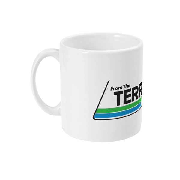 A white ceramic mug with blue and green accents, and text that reads 'FTT The TERRACES'.