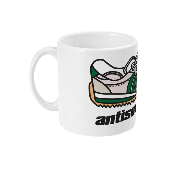 A white ceramic mug with a graphic print of a trainer and the text 'antisocialite'.