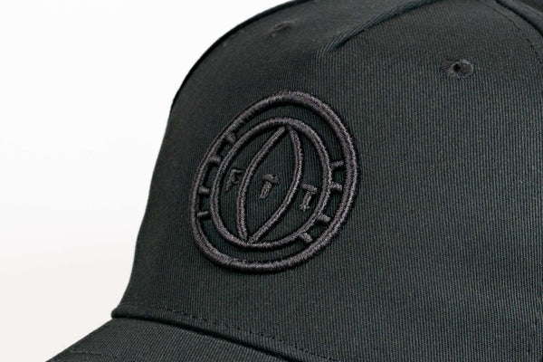 Black cap with a logo on a white background