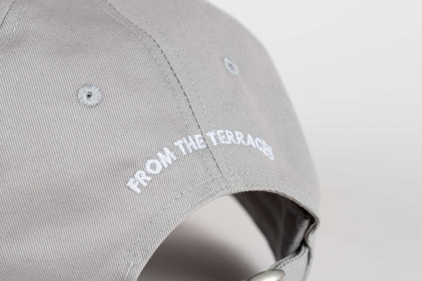 Gray cap with 'FROM THE TERRACES' text on a light gray background