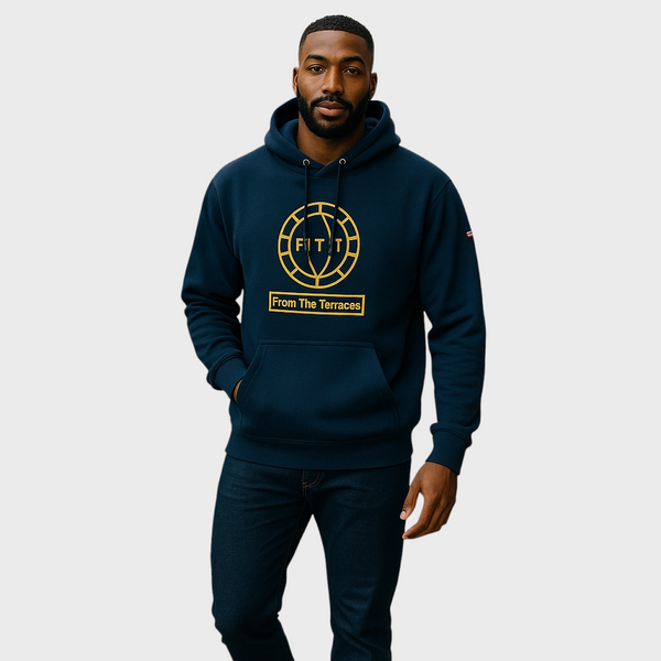 Man wearing a navy hoodie with yellow logo and text on a light gray background